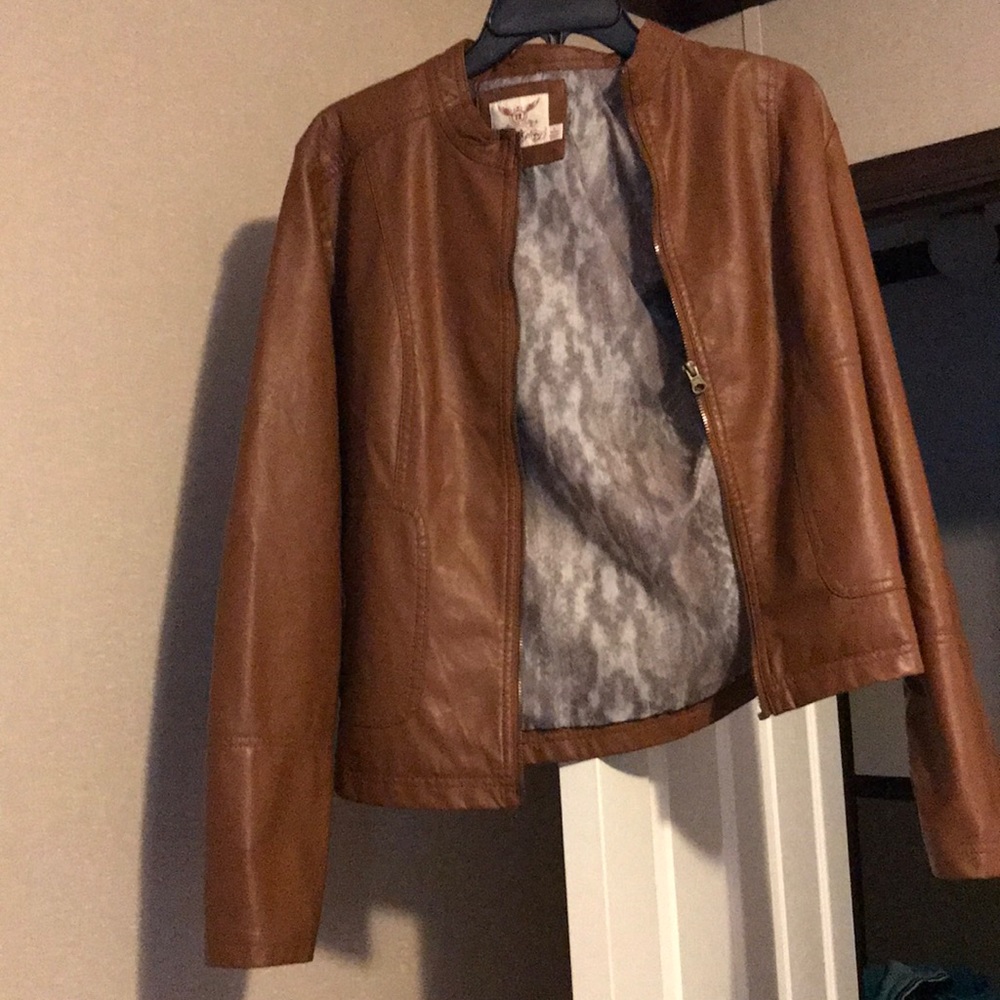 brown / tan colored leather jacket